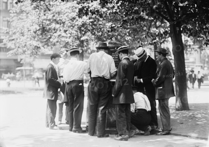 Ice water in the park--hot day, N.Y.C., between c1910 and c1915. Creator: Bain News Service.