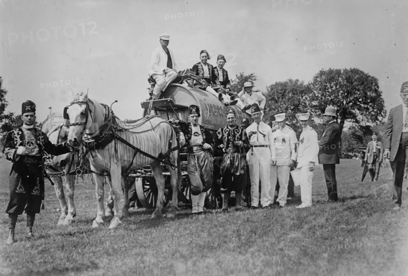 Shriners on water wagon, Rochester, between c1910 and c1915. Creator: Bain News Service.