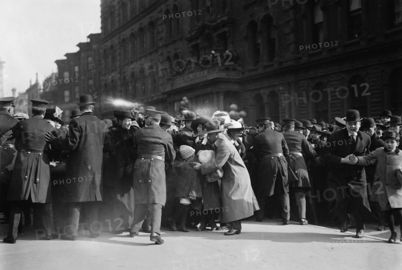 Police keeping crowd back, St. Patricks Day, 1913. Creator: Bain News Service.