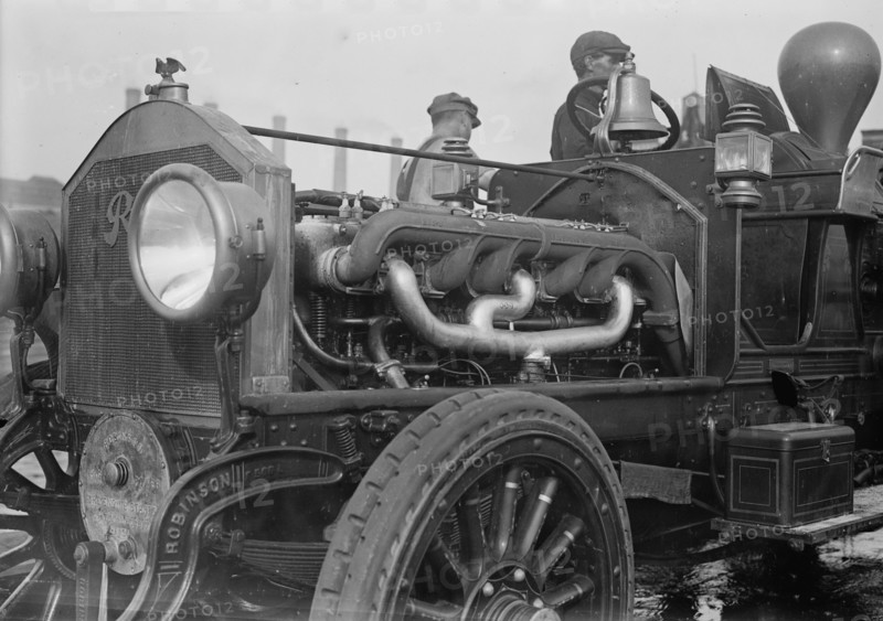 Under the hood of the motor fire engine, 1913. Creator: Bain News Service.