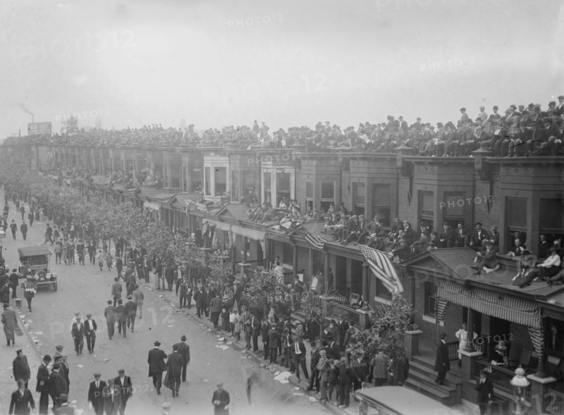 Fans on buildings outside Shibe Park, Philadelphia, during 1913 World Series (baseball), 1913. Creator: Bain News Service.