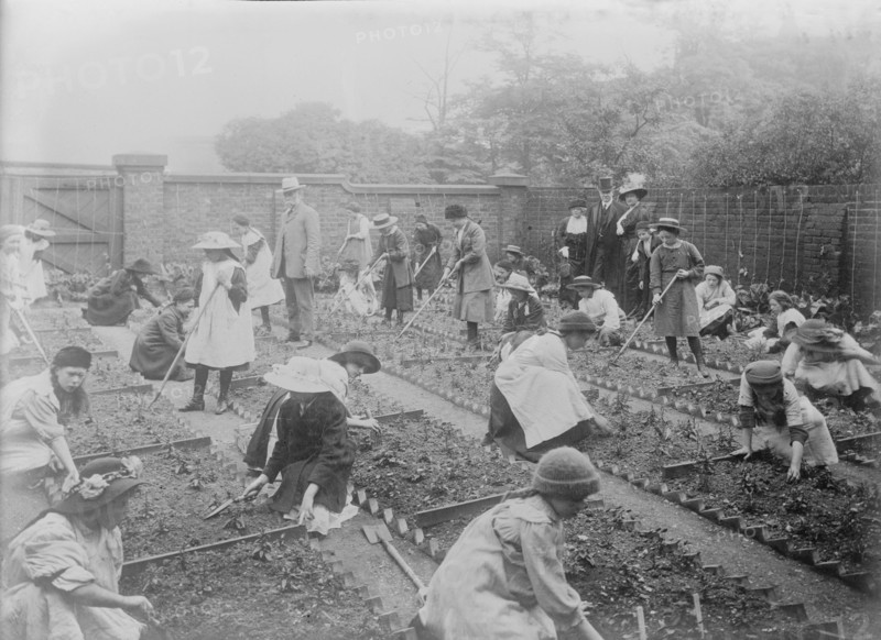 Lady Henry showing T.P. O'Connor over Children's Garden, 1913. Creator: Bain News Service.