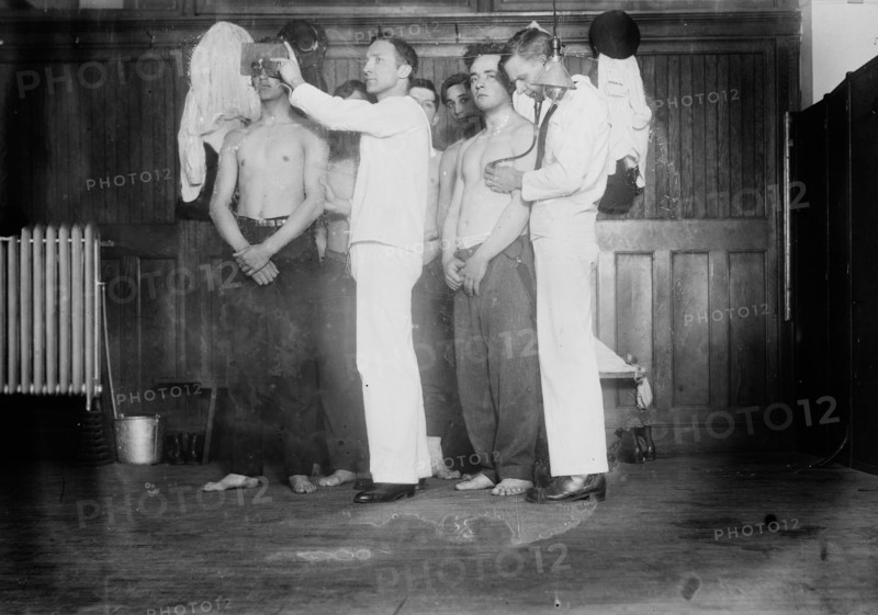 Examining new Navy Recruits, between c1910 and c1915. Creator: Bain News Service.