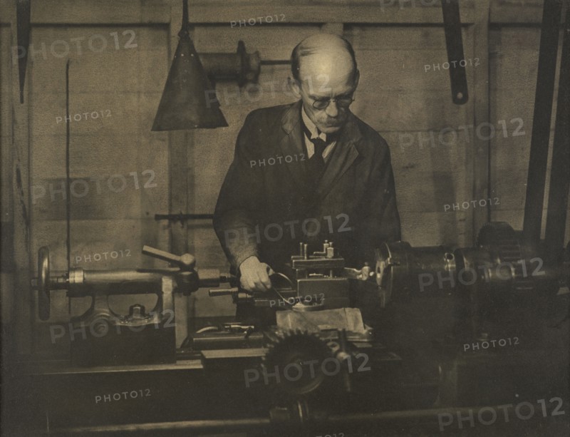 Untitled (Industry; man working lathe), 1920s. Creator: AJ Wales.