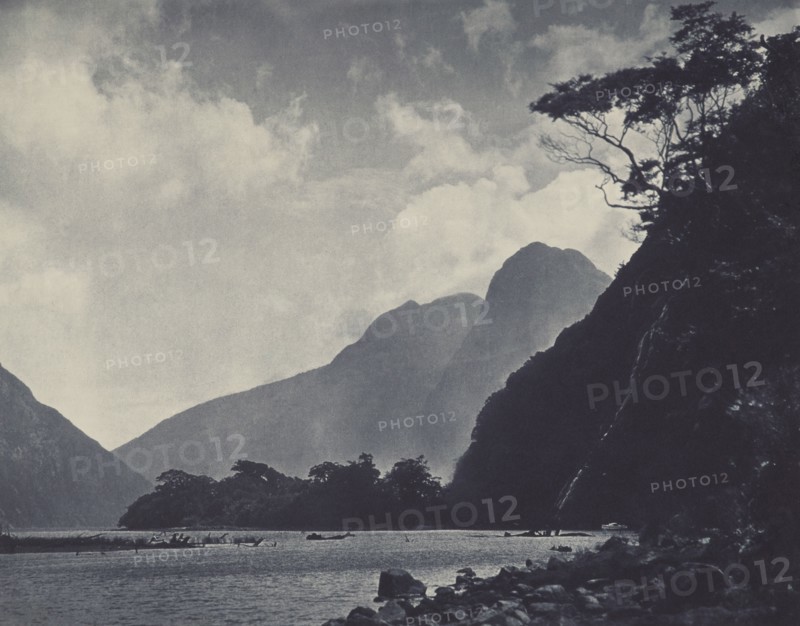 In Milford Sound, 1920s. Creator: Harry Moult.