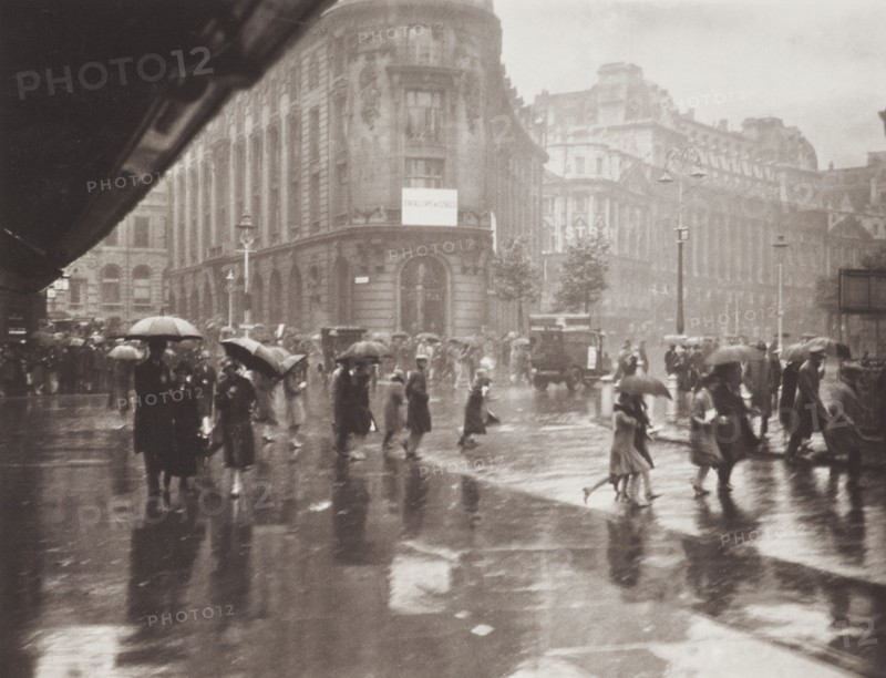 One of Londons wet days. From the album: Photograph album - London, 1920s. Creator: Harry Moult.