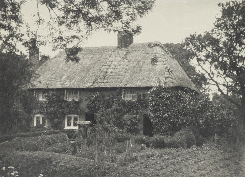 Thatched cottage. From the album: Photograph album - England, 1920s. Creator: Harry Moult.