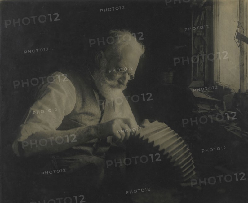 The camera doctor, 1920s-1930s. Creator: John Johnson.