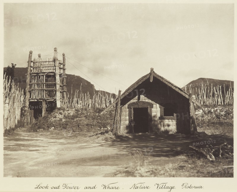 Look-out tower and whare, native village, Rotorua, 1920s. Creator: Harry Moult.