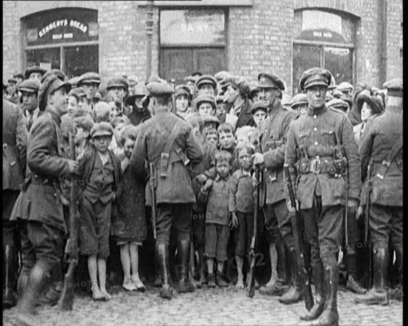 Soldiers Holding Back Children in Dublin, 1922. Creator: British Pathe Ltd.