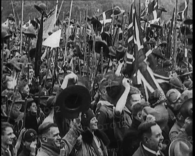 Large Numbers of Boy Scouts and Male Civilians Cheering at Jamboree, 1929. Creator: British Pathe Ltd.