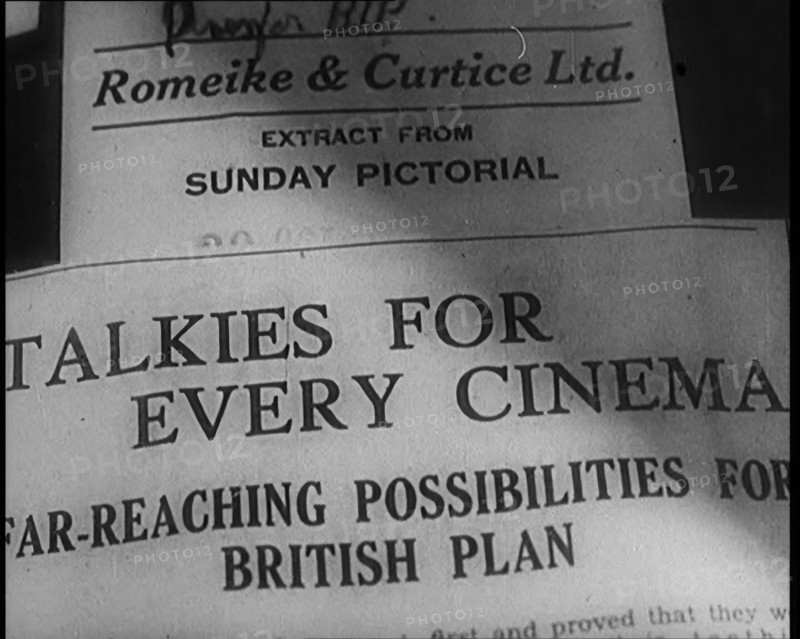 A Shot of the Film Weekly. Headline Reads: 'Talkies for Every Cinema. Far Reaching..., 1929. Creator: British Pathe Ltd.