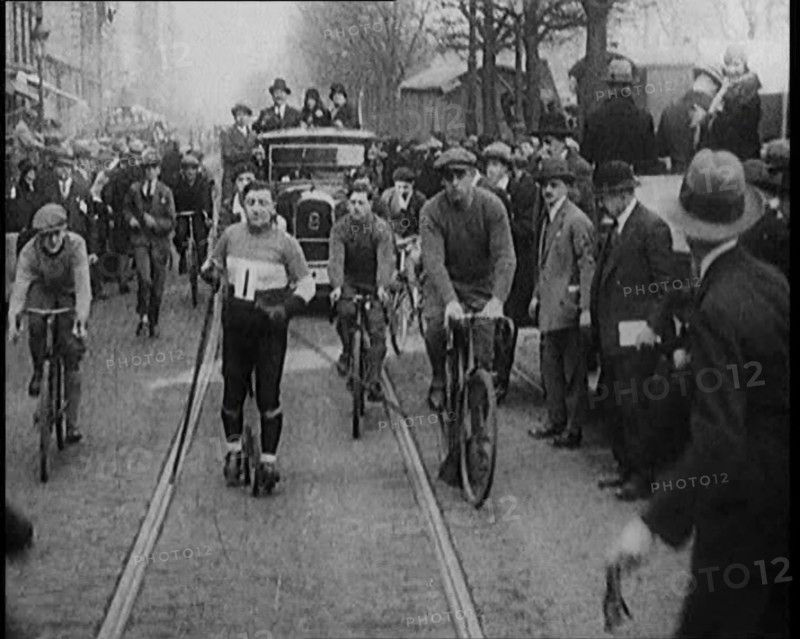 Racers Skiing Through Paris, France on Wheeled Skis, 1929. Creator: British Pathe Ltd.