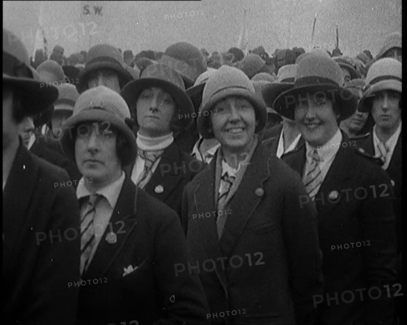 A Group of Female Civilians Wearing Ties, Coats and Hats at a Political Rally, 1920. Creator: British Pathe Ltd.