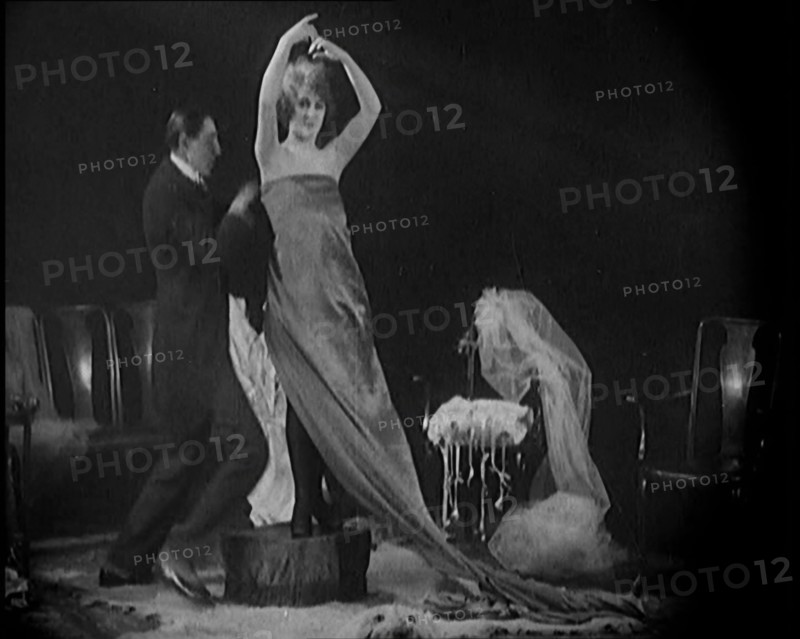 Alphonse Berge, Famous Fashion Designer,  Constructing a Dress, a Female Civilian Model..., 1920. Creator: British Pathe Ltd.