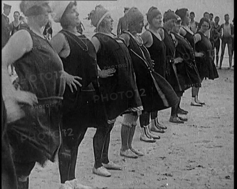 A Group of Plus Size Female Civilians Exercising on a Beach, 1920. Creator: British Pathe Ltd.