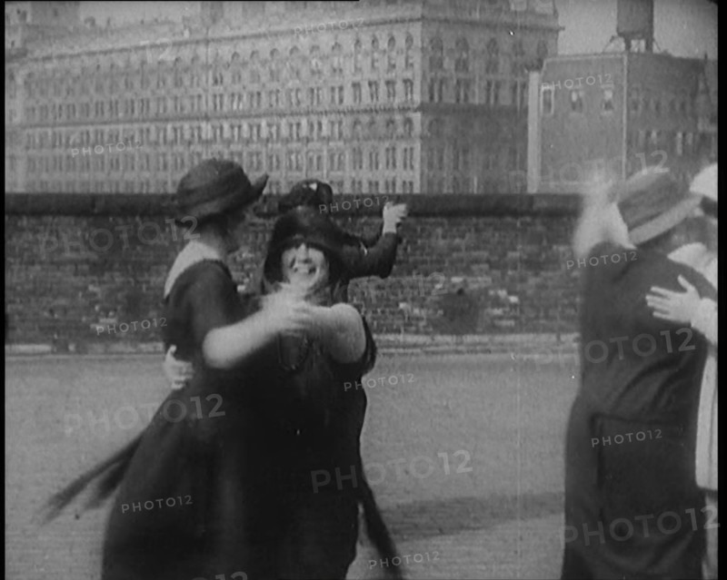 A Group of Plus Size Female Civilians Dancing on a Beach, 1920. Creator: British Pathe Ltd.