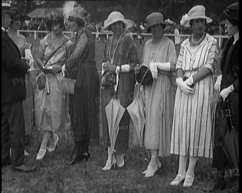 A Group of Female Civilians Dressed Glamorously at a Horse Racing Event, 1920. Creator: British Pathe Ltd.