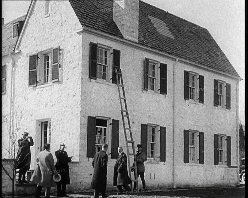 Male American Civilians in Front of American Aviator Charles Augustus Lindbergh's House..., 1930s. Creator: British Pathe Ltd.