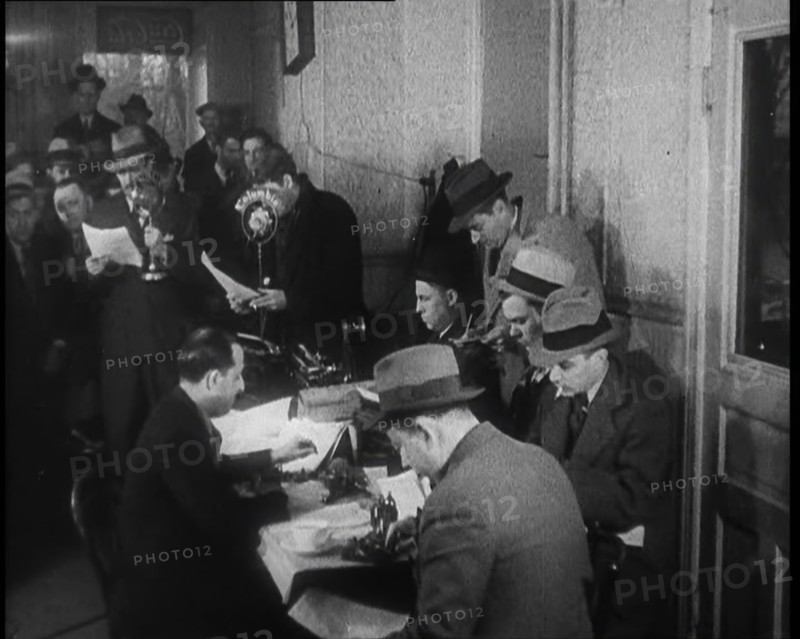 A Group of Male American Civilians in a Press Room, 1930s. Creator: British Pathe Ltd.