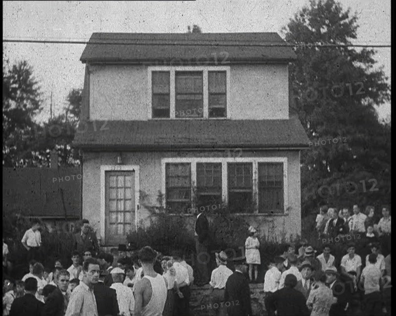 Small Crowd of American Civilians Gathering Outside Bruno Richard Hauptman's House in the..., 1930s. Creator: British Pathe Ltd.