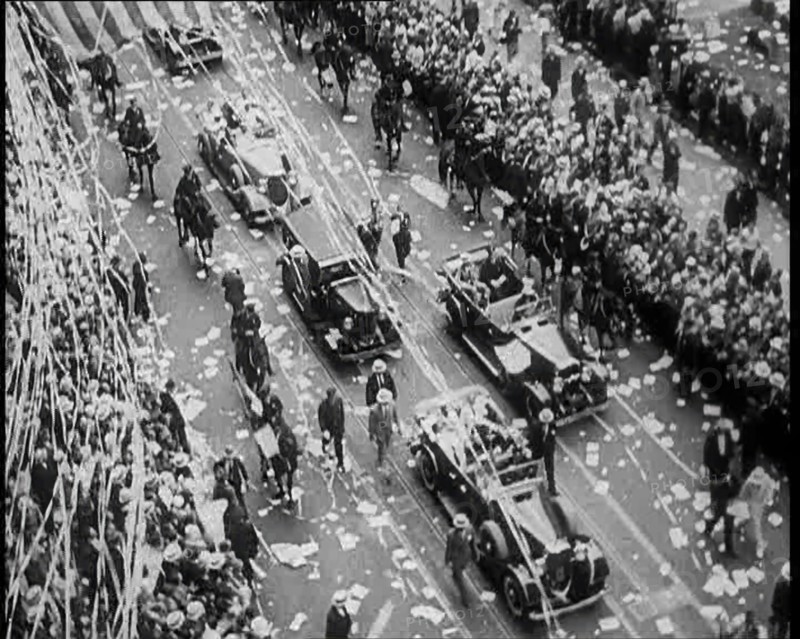 Cars Driving Down in a Parade Watched by Crowds, 1933. Creator: British Pathe Ltd.
