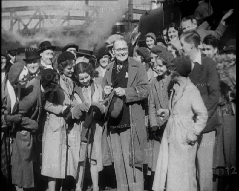 People Standing at  a Train Station, 1933. Creator: British Pathe Ltd.
