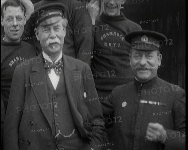 Sir Thomas Lipton Standing With the Crew of the Ship 'The Shamrock', 1920. Creator: British Pathe Ltd.