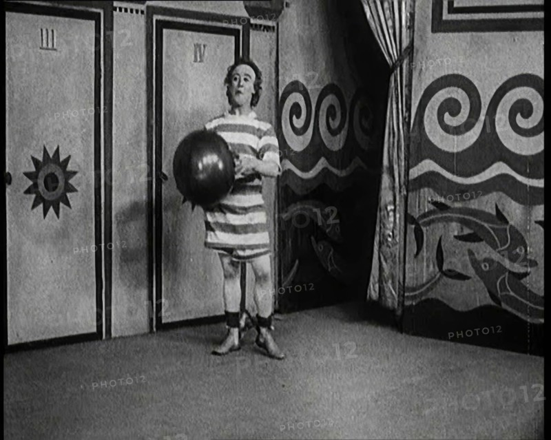 Stanley Lupino Performing in a Show in London Wearing a Stripy Bathing Suit, 1922. Creator: British Pathe Ltd.