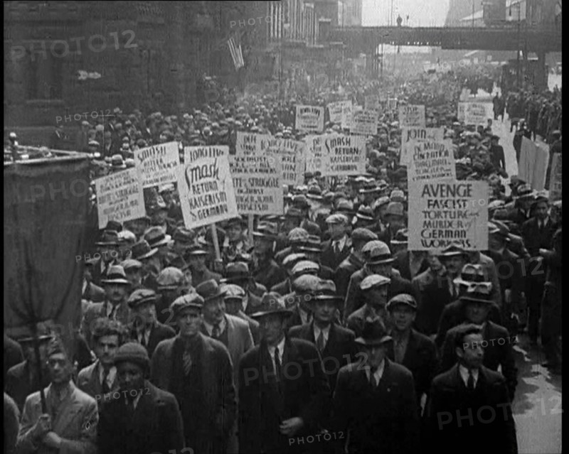 American anti-fascists Marching and Holding Signs, 1933. Creator: British Pathe Ltd.