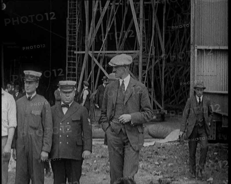 American Airship Crew Members Standing Outside the Hangar of an R 38 Airship in the United..., 1921. Creator: British Pathe Ltd.