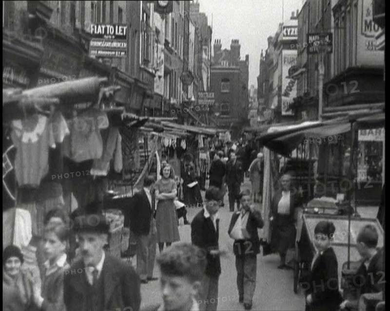 Crowds Milling Around Berwick Street Market, 1930s. Creator: British Pathe Ltd.