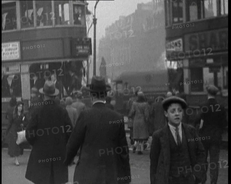People Walking Around the Streets of London, 1930s. Creator: British Pathe Ltd.