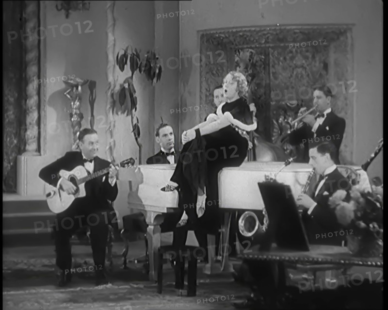The Singer Elsie Carlisle and Her Band Performing a Song About Her Boyfriend Who Has Gone..., 1931. Creator: British Pathe Ltd.