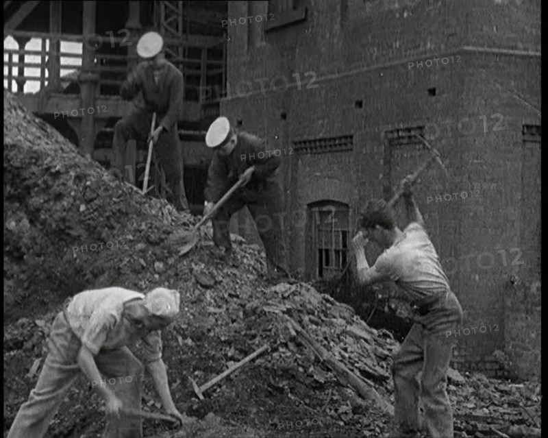 Sailors Digging Coal Outside, 1921. Creator: British Pathe Ltd.