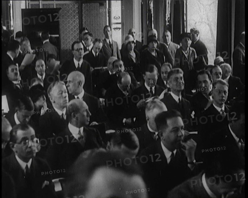 A Large Group of Male and Female Delegates from the League of Nations Sitting in a Room, 1924. Creator: British Pathe Ltd.