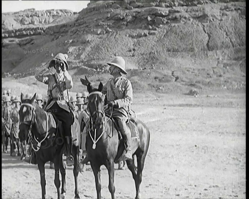 Scene from a Film: a Male Actor Playing a British Soldier on Horseback Looking Through..., 1920s. Creator: British Pathe Ltd.