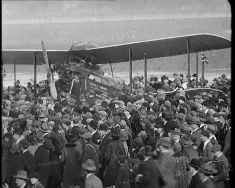 A Large Group of People Crowding Around Sir Alan Cobham's Aeroplane Greeting Him on His..., 1926. Creator: British Pathe Ltd.