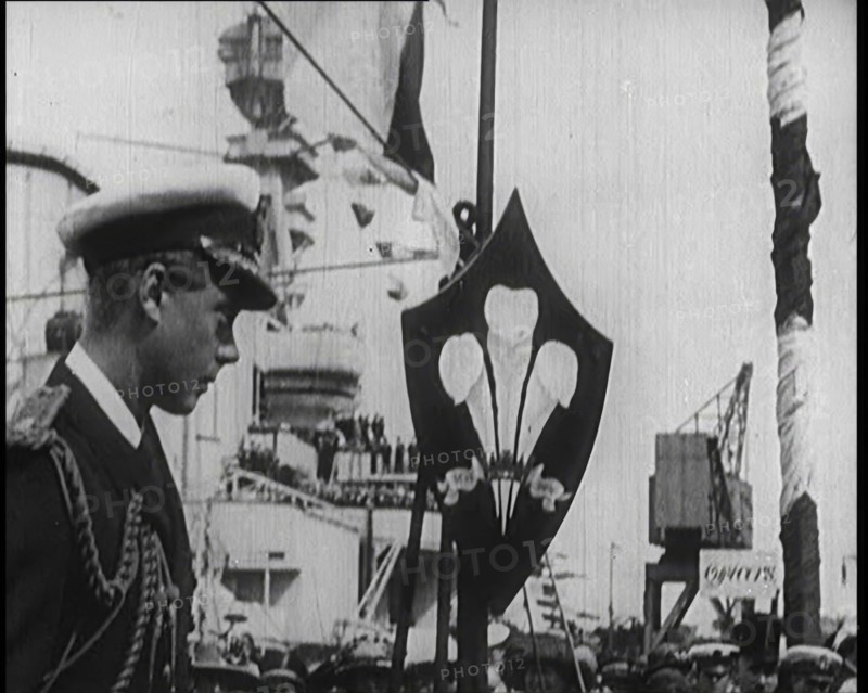 Edward, Prince of Wales, Stood on a Dock, With a Large Ship Behind Him, 1922. Creator: British Pathe Ltd.