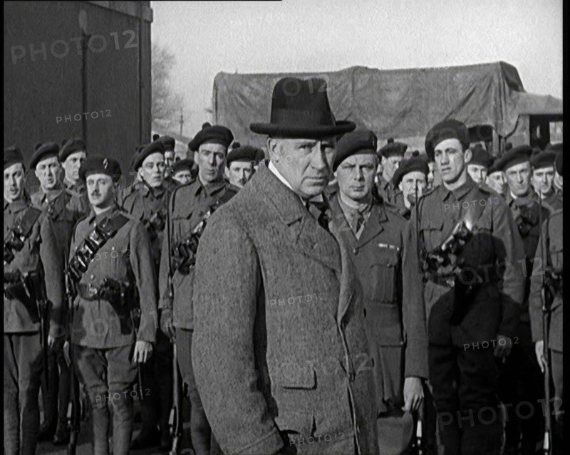 A British Man Inspecting and Speaking to Lines of Irish Auxiliary Soldiers, 1921. Creator: British Pathe Ltd.