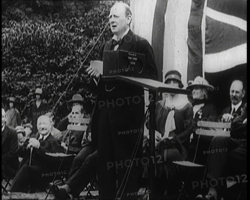 Winston Churchill Making a Speech from a Platform Infront of a Small Crowd, 1924. Creator: British Pathe Ltd.