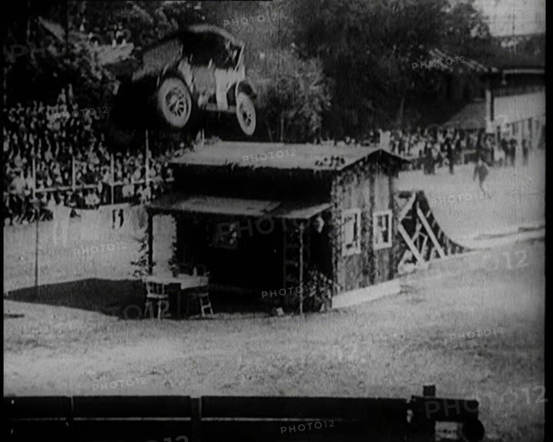 A Motorcar Jumping Over a Wooden Shack, 1920. Creator: British Pathe Ltd.