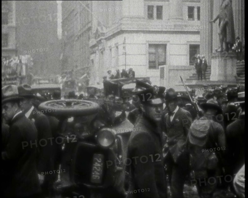 Police Looking Over Overturned Vehicles in New York City After a Bomb Was Thrown at the..., 1920. Creator: British Pathe Ltd.