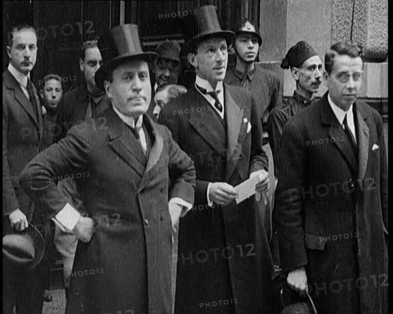Italian Prime Minister Benito Mussolini Standing With Other Italian Politicians, 1922. Creator: British Pathe Ltd.