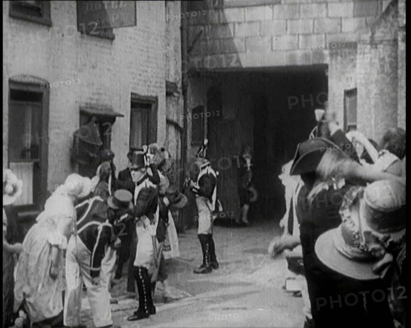 Scene from the Feature Film 'Nelson': Crowds of Actors in Period Costume Being..., 1920s. Creator: British Pathe Ltd.