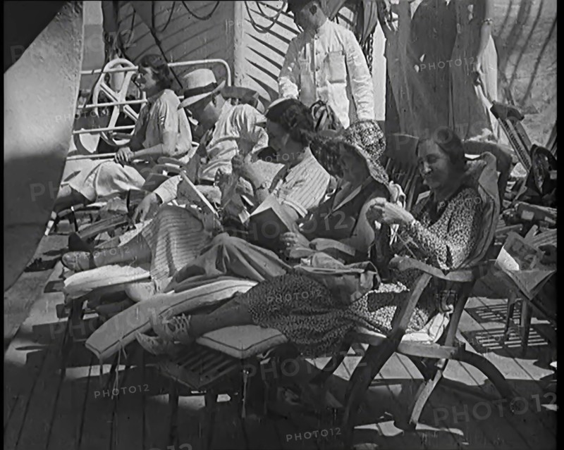 People Sitting on Deck Chairs on the Deck of a Cruise Liner Whilst at Sea, 1931. Creator: British Pathe Ltd.