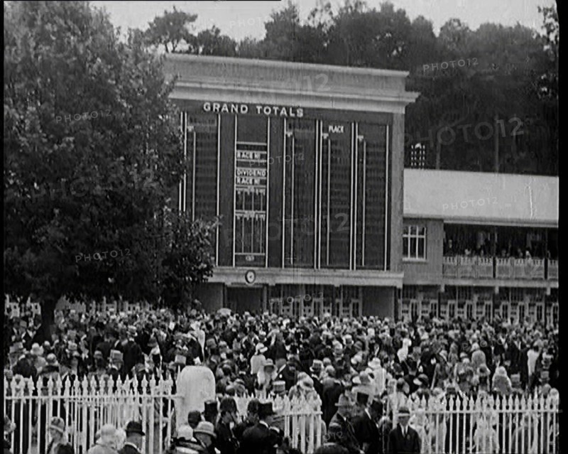 Totaliser/Tote Board at a Crowded Horse Racing Track, 1931. Creator: British Pathe Ltd.