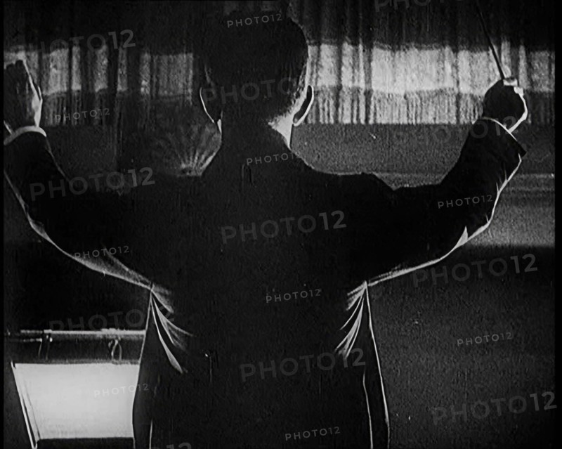 Conductor Starting a Show in London, 1922. Creator: British Pathe Ltd.