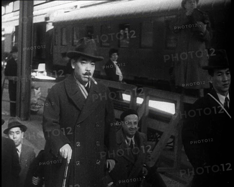 Japanese League of Nations Delegates Entering a Train Station, 1933. Creator: British Pathe Ltd.
