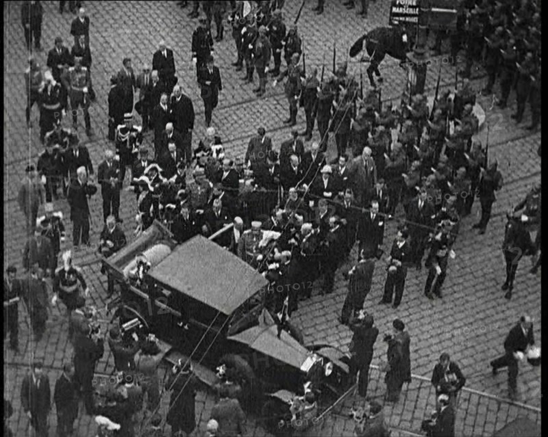 Alexander I, His Majesty the King of Yugoslavia Entering a Car, Surrounded by a Crowd, 1934. Creator: British Pathe Ltd.
